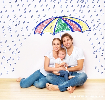 concept: social protection of family. family took refuge from  miseries and rain under umbrella